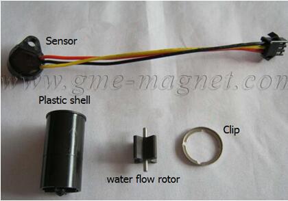 Injection molded magnetic water flow rotor for water heater